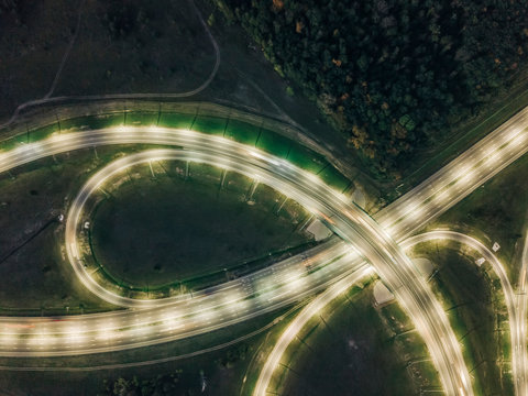 Highway Road Junction At Night, Top View From Drone