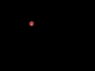 Blood Moon - The lunar eclipse on July 27, 2018 on a black background.