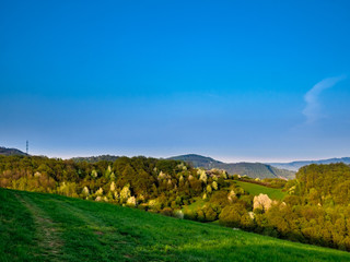 View of a mountainous landscape with an almost pure blue sky