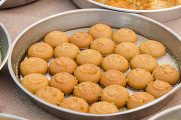 Traditional turkish sweet cookies called Şekerpare, in a tray ready to be served 