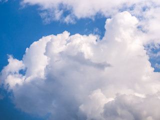 Naklejka na ściany i meble Beautiful large cloud in the blue sky