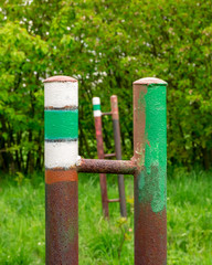 Rusty columns with tourist markings