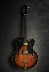vintage guitar isolated on a black background