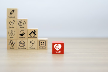 Health promotion Graphic Icon on Wooden block.