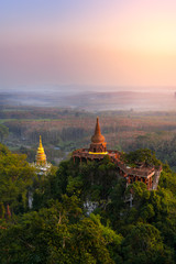 Lanscape of two pagodas on top mountain at Dharma Khao Na Nai Luang Park  Surat Thani, Thailand.