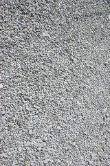 Ground stone grey background of many small stones