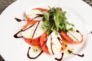Tomato cheese salad on a plate