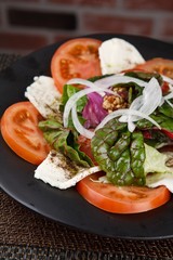 Tomato cheese salad on a plate