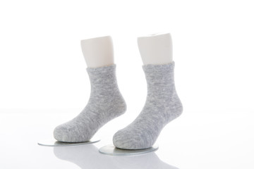 Exquisite and fashionable socks are displayed on the counter of the shop.