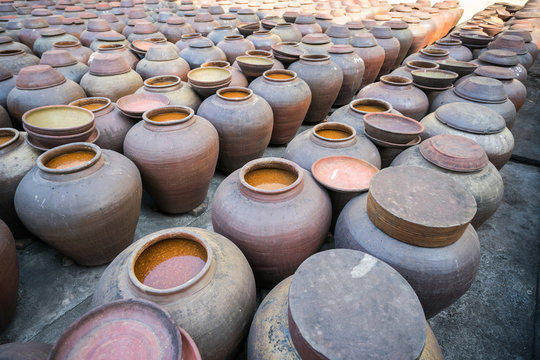 Jars Of Processing Soybean Jam Made By Traditional Outdoor Way Under Natural Sunlight