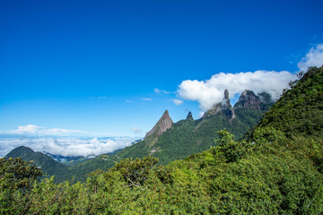 Clouds in the mountains. Exotic Mountains. Wonderful Mountains. Mountain Finger of God, the city of Teresopolis, State of Rio de Janeiro, Brazil, South America.