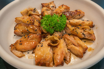 Well decorated Korean fried chicken with soy sauce and sesame