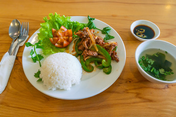 Typical Asian meal with stir fried beef and white rice