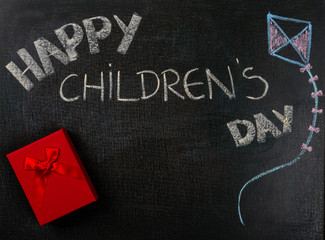 Fototapeta na wymiar Drawing on sandpaper. Happy Children's day and gift. Copy space.