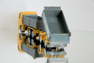 Fototapeta premium Model truck on mirrored floor