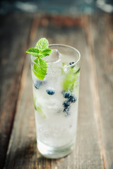 Blueberry mojito cocktail. Selective focus. Shallow depth of field.