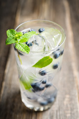 Blueberry mojito cocktail. Selective focus. Shallow depth of field.