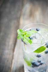 Blueberry mojito cocktail. Selective focus. Shallow depth of field.