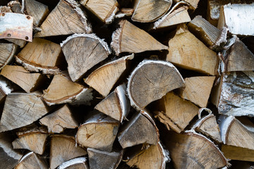 Woodpile in countryside close up. Useful natural background.