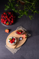 delicious milk rice with different berries and red fruit jelly