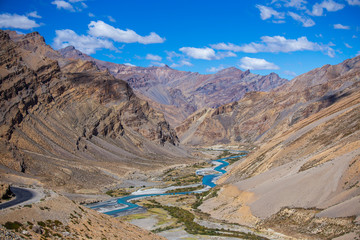 Himalayan mountain landscape along Leh to Manali highway. Blue river and rocky mountains in Indian Himalayas, India