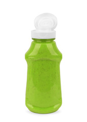 Pesto sauce in the glass jar on the white background