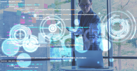 Businessman programmer coding program with computer language