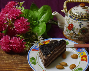 teapot, cup of tea and cake