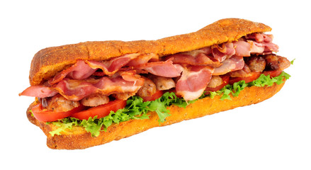 Sausage and bacon filled ciabatta bread sandwich with lettuce and tomato isolated on a white background