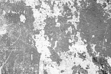 Texture of a concrete wall with cracks and scratches which can be used as a background