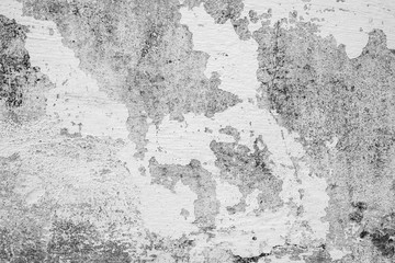 Texture of a concrete wall with cracks and scratches which can be used as a background