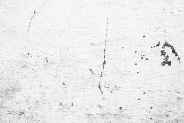 Texture of a concrete wall with cracks and scratches which can be used as a background