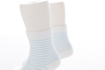 Exquisite and fashionable socks are displayed on the counter of the shop.