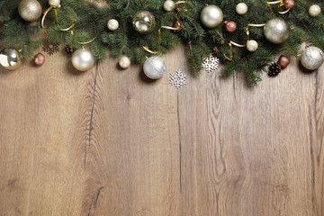 Festive Christmas decoration on wooden background, flat lay. Space for text