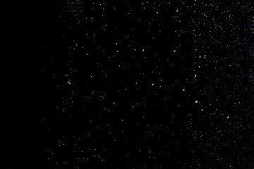 Abstract dust explosion on a black background