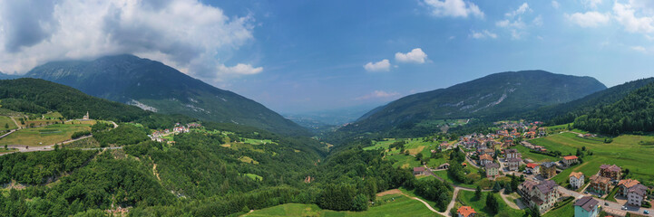 Fototapeta na wymiar Panoramic view of the ski resort Andalo Trento northern Italy. Aerial view, summertime.
