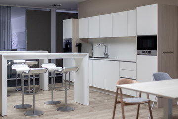 a beautiful modern office kitchen provides for a pleasant working climate