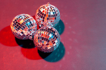 Mirror party balls put on table close up
