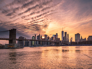 Fototapeta na wymiar View to New York Manhattan at dusk in colorful impression