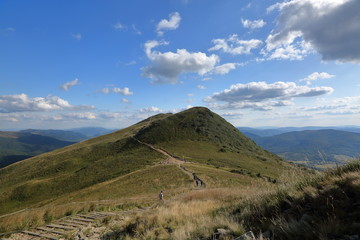 Fototapeta premium landscape with Bieszczady mountains in Poland, Tarnica peak, blue sky and clouds