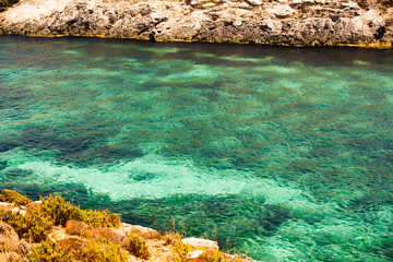 Emerald and turquoise waters and mediterranean sun