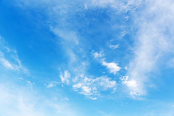 Naklejka na ściany i meble Blue sky with white clouds, background.