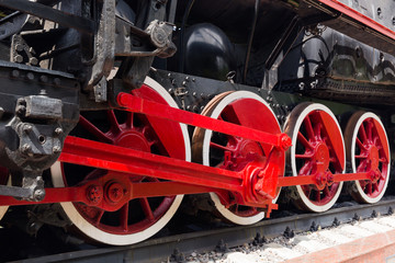 Vintage steam locomotive. The steam locomotive wheels close-up