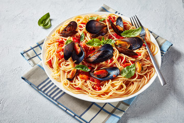 pasta with Mussels on a white platter