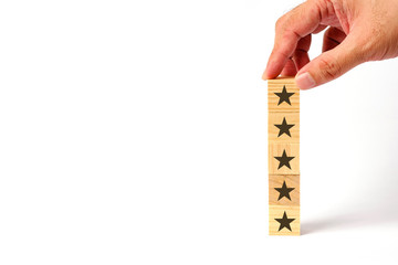 Customer service evaluation and survey concept with wooden block stacked vertically