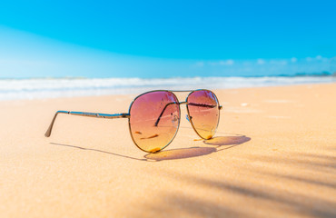 Sunglasses on the coastal beaches under the sun