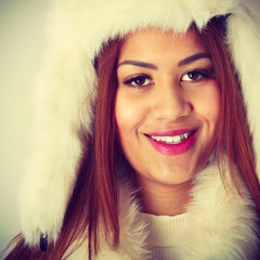 woman wearing winter fur cap