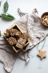 Granola bar. Healthy snack on marble background with copy space