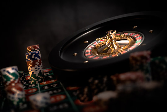 People and entertainment concept. Casino, gambling, poker,  roulete