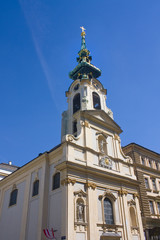 Fototapeta na wymiar Collegiate Church (Stiftskirche) in Old Town of Vienna, Austria